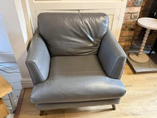Grey leather arm chair