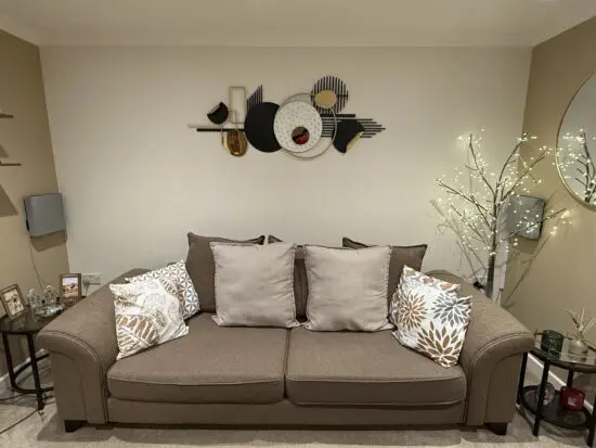 DFS 4 seater brown scatter back sofa