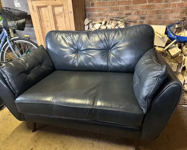 DFS Leather sofa. French connection Zinc