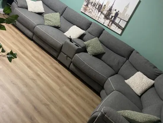 DFS Grey reclining corner sofa with charging ports