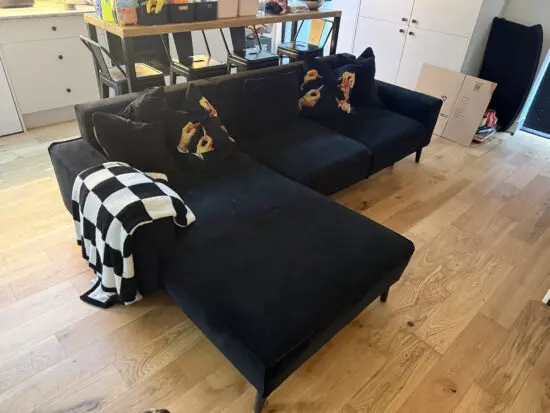 Black chaise corner sofa
