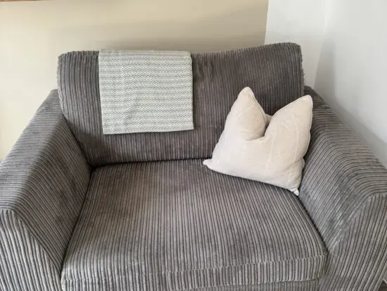 DFS GREY CUDDLER SOFA