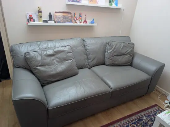 Grey 3-4 seater leather sofa