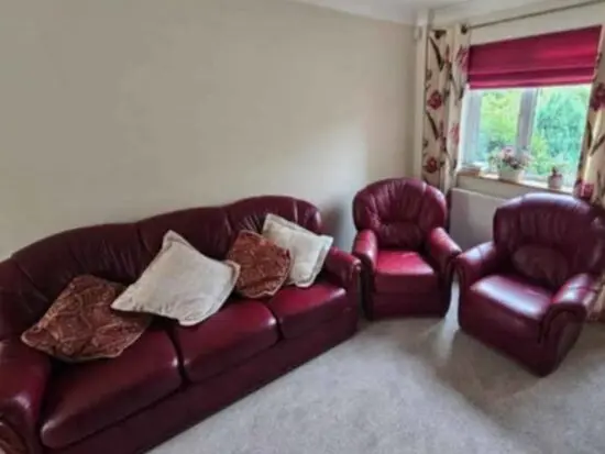 Burgundy leather sofa from Italy