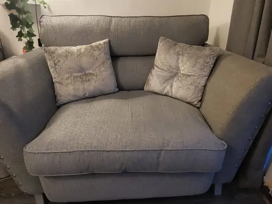 Large 2 seater sofa and cuddle chair, grey fabric with silver sparkle thread bought from scs 4 years ago.