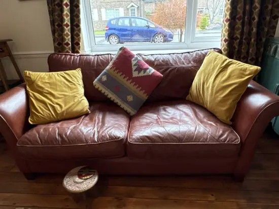 DFS brown leather 3 seater sofa
