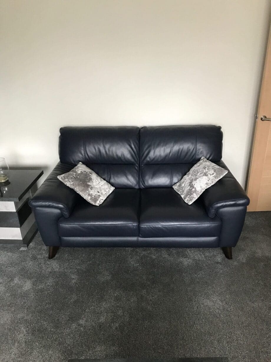 DFS Black Leather 3 and 2 Seater plus Single Chair