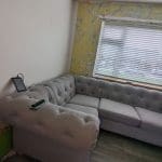 DFS Grey Chesterfield Style Corner Sofa