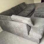 DFS Grey Cord Corner Sofa and Matching Footstool