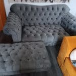 Grey velour Chesterfield 2/3 seater sofa and puffa