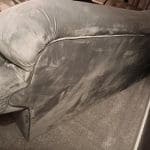 Grey velour Chesterfield 2/3 seater sofa and puffa