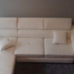 White leather corner sofa bed