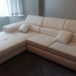 White leather corner sofa bed