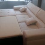 White leather corner sofa bed