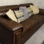 Large 3 in 1 and 2 in 1 leather sofa and footstool for sale