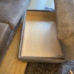 Large grey sofa with ottoman footstool