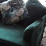 Large three seater forest green velvet sofa