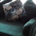 Large three seater forest green velvet sofa