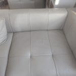 Leather couch with foot stool