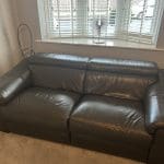 2 grey leather recliner sofas