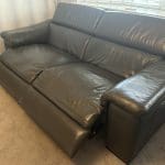 2 grey leather recliner sofas