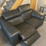 2 grey leather recliner sofas
