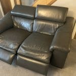 2 grey leather recliner sofas