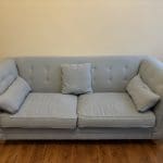 Two seater fabric sofa in blue