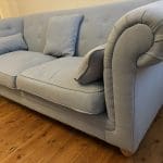 Two seater fabric sofa in blue