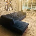 Blue velvet chaise corner sofa with ottoman