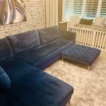 Blue velvet chaise corner sofa with ottoman