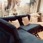 Blue velvet chaise corner sofa with ottoman