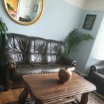 2 brown leather sofas oak handles