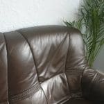 2 brown leather sofas oak handles