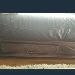 2 brown leather sofas oak handles