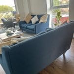 Two blue sofas