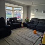 3 piece black material sofa set