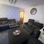 2 grey electric recliner sofas