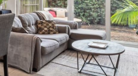Ashley Furniture Grey Loveseat and Chaise