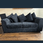 Black plush sofas