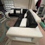 Black and white Leather Racer back L shaped sofa