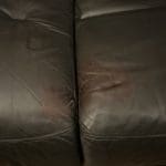 Dark brown leather sofa double recliner
