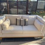 A PAIR of two seater sofas made by MultiYork