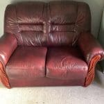 DFS two two seater,blood red leather sofas
