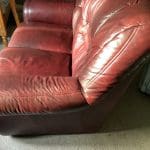 DFS two two seater,blood red leather sofas