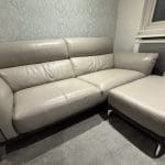 DFS Three seater + footstool - leather two tone