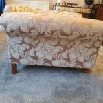 Gold and beige floral armchair