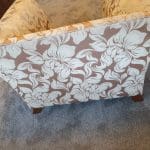 Gold and beige floral armchair