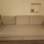Massive grey three seater sofa bed