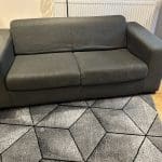 2-seater dark grey fabric sofa